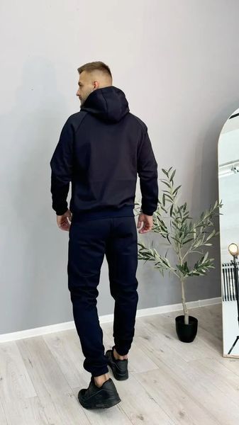Жіночий теплий спортивний костюм Nike унісекс темно-синього кольору зимовий трикотажний комплект на флісі норма затишне худі та штани 11111 фото