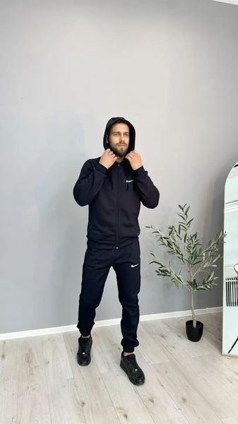 Жіночий теплий спортивний костюм Nike унісекс темно-синього кольору зимовий трикотажний комплект на флісі норма затишне худі та штани 11111 фото