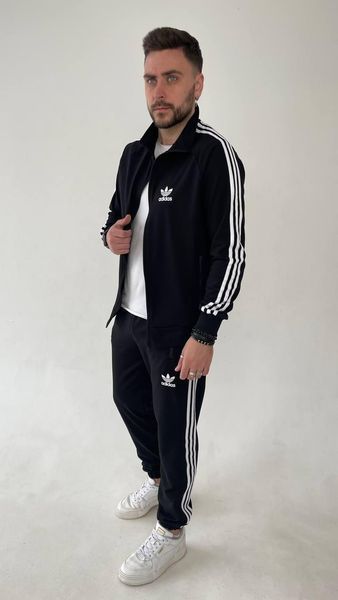Чоловічий спортивний костюм з коміром-стійкою чорного кольору демісезонний трикотажний комплект норма базовий чоловічий набір 630 фото